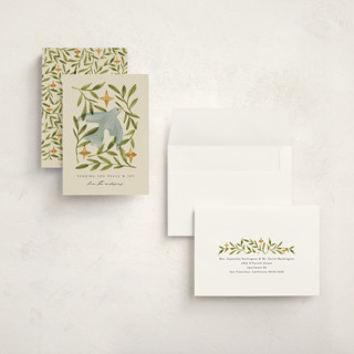 This is a cream holiday photo cards with standard by Amy Kross called finding the light printing on signature in grand