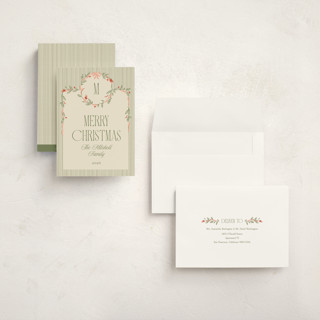 This is a cream holiday photo cards with standard by Robert and Stella called wreath frame printing on signature in grand