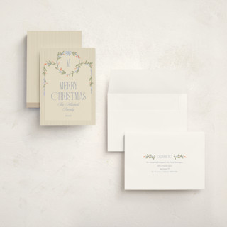 This is a periwinkle holiday photo cards with standard by Robert and Stella called wreath frame printing on signature in grand