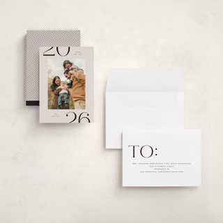 This is a champagne holiday photo cards with standard by Michelle Taylor called on the edge printing on recycled smooth signature in grand