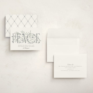 This is a snow holiday photo cards with standard by Robert and Stella called entwined peace printing on signature in grand