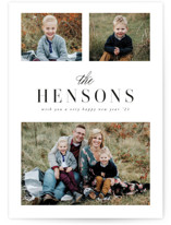 This is a white holiday photo card by Ink and Letter called Joyful Wishes with standard printing on smooth signature in grand.