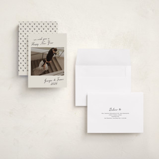 This is a sandstone holiday photo cards with standard by Nicole Walsh called new year note printing on signature in grand