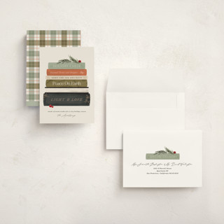 This is a dried orange holiday photo cards with standard by Kate Ahn called book stack printing on signature in grand