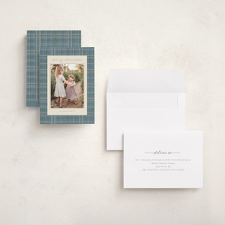 This is a powder blue holiday photo cards with standard by Baumbirdy called traditional plaid printing on signature in grand