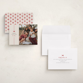 This is a poinsettia holiday photo cards with standard by Pixel and Hank called bow printing on recycled smooth signature in grand