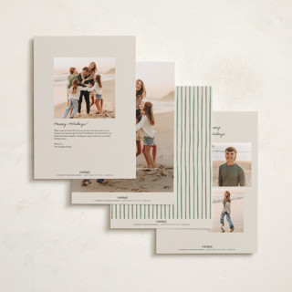 This is a moss holiday photo cards with standard by Chris Griffith called holiday wrap printing on signature in grand