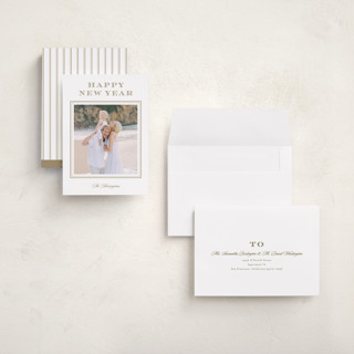 This is a caramel holiday photo cards with standard by Stacey Meacham called resort style printing on signature in grand