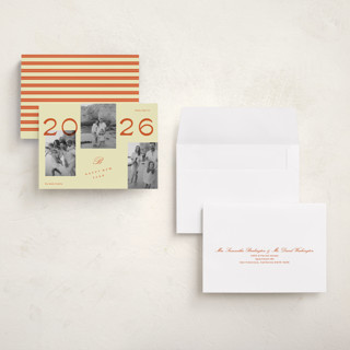 This is a buttercream holiday photo cards with standard by Rachel Cassel called a bold year printing on recycled smooth signature in grand