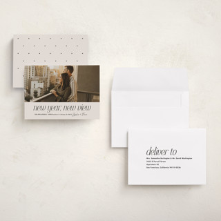 This is a vanilla holiday photo cards with standard by Lea Delaveris called new view printing on recycled smooth signature in grand
