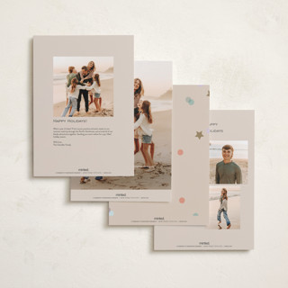This is a confetti holiday photo cards with standard by Pixel and Hank called confetti cheers printing on recycled smooth signature in grand