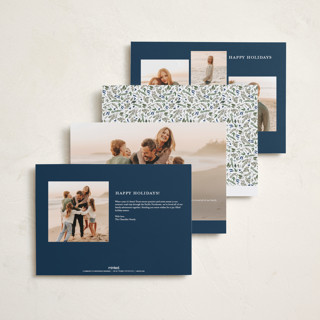 This is a winter berry holiday photo cards with standard by Susan Moyal called holly & pine printing on recycled smooth signature in grand