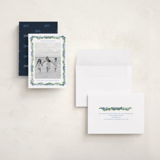 This is a frosted holiday photo cards with standard by Sarah Knight called boughs of bows printing on recycled smooth signature in grand