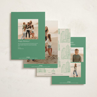 This is a moss holiday photo cards with standard by Vera Lim called in the city printing on signature in grand