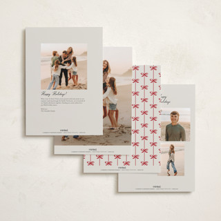This is a poinsettia holiday photo cards with standard by Pixel and Hank called bow printing on recycled smooth signature in grand