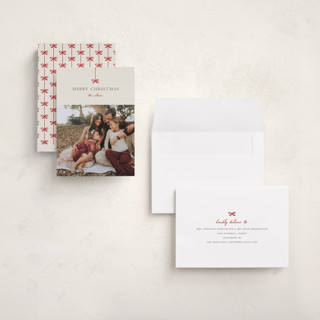 This is a poinsettia holiday photo cards with standard by Pixel and Hank called bow printing on recycled smooth signature in grand