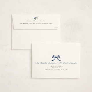 This is a blue spruce holiday photo cards with standard by Susan Moyal called holiday bow printing on signature in grand