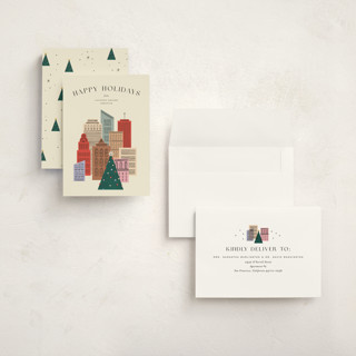 This is a sunny holiday photo cards with standard by Pixel and Hank called holiday cityscape printing on signature in grand