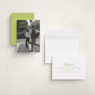 This is a mistletoe glow holiday photo cards with standard by JoAnn Jinks called neon vintage printing on signature in grand