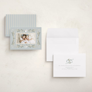 This is a blue spruce holiday photo cards with standard by Ana de Sousa called ribbon of grace printing on signature in grand