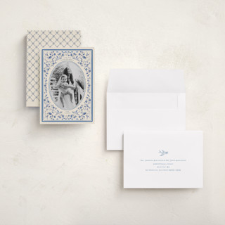 This is a porcelain holiday photo cards with standard by Sabrin Deirani called peaceful blooms in blue printing on signature in grand