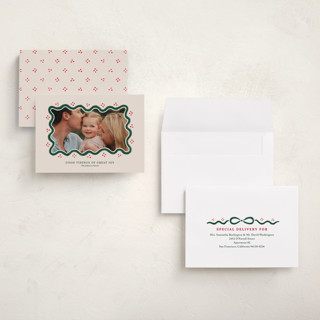 This is a holly berry holiday photo cards with standard by Rachel Mattern called good tidings & great joy printing on signature in grand