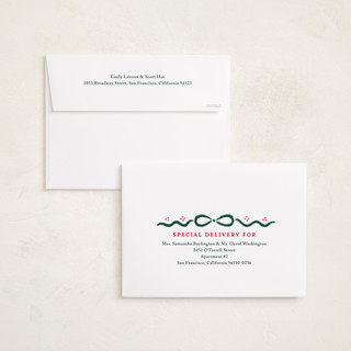 This is a holly berry holiday photo cards with standard by Rachel Mattern called good tidings & great joy printing on signature in grand