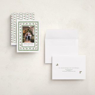 This is a snow holiday photo cards with standard by Lauren Jopling called holly berry frame printing on signature in grand