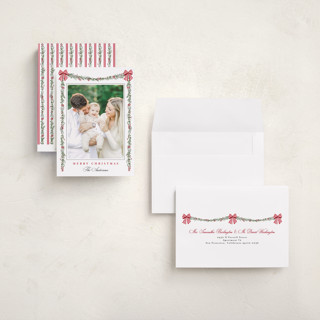 This is a candy cane holiday photo cards with standard by Susan Moyal called holly & bows printing on signature in grand