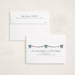 This is a winter berry holiday photo cards with standard by Susan Moyal called holly & bows printing on recycled smooth signature in grand