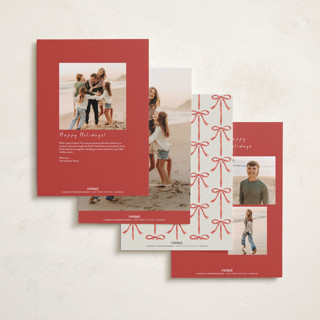 This is a peppermint holiday photo cards with standard by Laura Hankins called painted bow printing on signature in grand