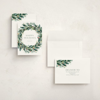 This is a vert holiday photo cards with standard by Jackie Crawford called watercolor festive wreath printing on signature in grand