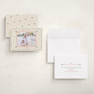 This is a holly holiday photo cards with standard by Sarah Rosenthal called holly tidings printing on signature in grand