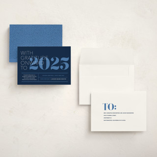 This is a blue night holiday photo cards with standard by Annie Clark called the grateful type printing on signature in grand