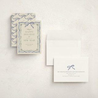 This is a saphire holiday photo cards with standard by Chris Griffith called ribbon stripe holiday printing on signature in grand