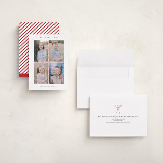 This is a candy cane holiday photo cards with standard by Dani Lugato called candy caner ribbon printing on recycled smooth signature in grand