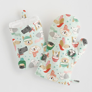 This is a mint aprons by Monika Torun called christmas puppies in standard