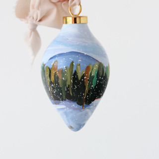 This is a green holiday decorations by Weronika Zubek called snowy pines ornament - 29 in standard