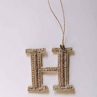 This is a silver holiday decorations by Courtney Bedi called personalized handmade letter ornament - large h in standard