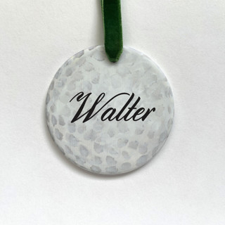 This is a white holiday decorations by Holly Whitcomb called personalized golf ceramic ornament in standard