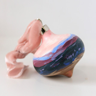 This is a purple holiday decorations by Weronika Zubek called purple mountain | 3” ornament | ceramic in standard