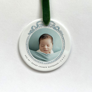 This is a white holiday decorations by Holly Whitcomb called personalized baby photo ornament - vintage ribbon in standard