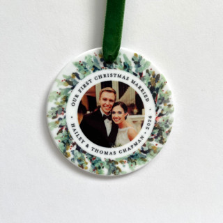 This is a white holiday decorations by Holly Whitcomb called personalized newlywed photo ornament, painted wreath in standard