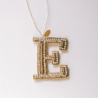 This is a silver holiday decorations by Courtney Bedi called personalized handmade letter ornament - large e in standard