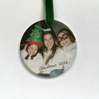 This is a white holiday decorations by Holly Whitcomb called personalized photo + script ornament in standard