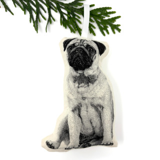 This is a beige holiday decorations by Broderpress called silkscreen pug ornament in standard