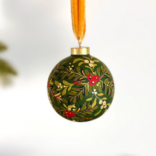 This is a multicolorassorted-colors holiday decorations by Sara Swanson called holiday sprigs on forest green- large round ornament in standard