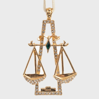 This is a gold holiday decorations by Joanna Buchanan called libra hanging ornament in standard