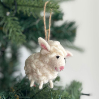This is a white holiday decorations by Ganapati Crafts Co. called felt mini sheep ornament - white in standard