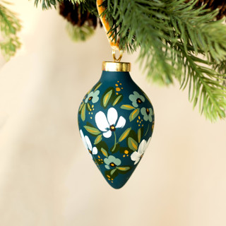 This is a multicolor christmas ornament by Sara Swanson called White and Teal Blooms - Teardrop shaped ornament in standard.